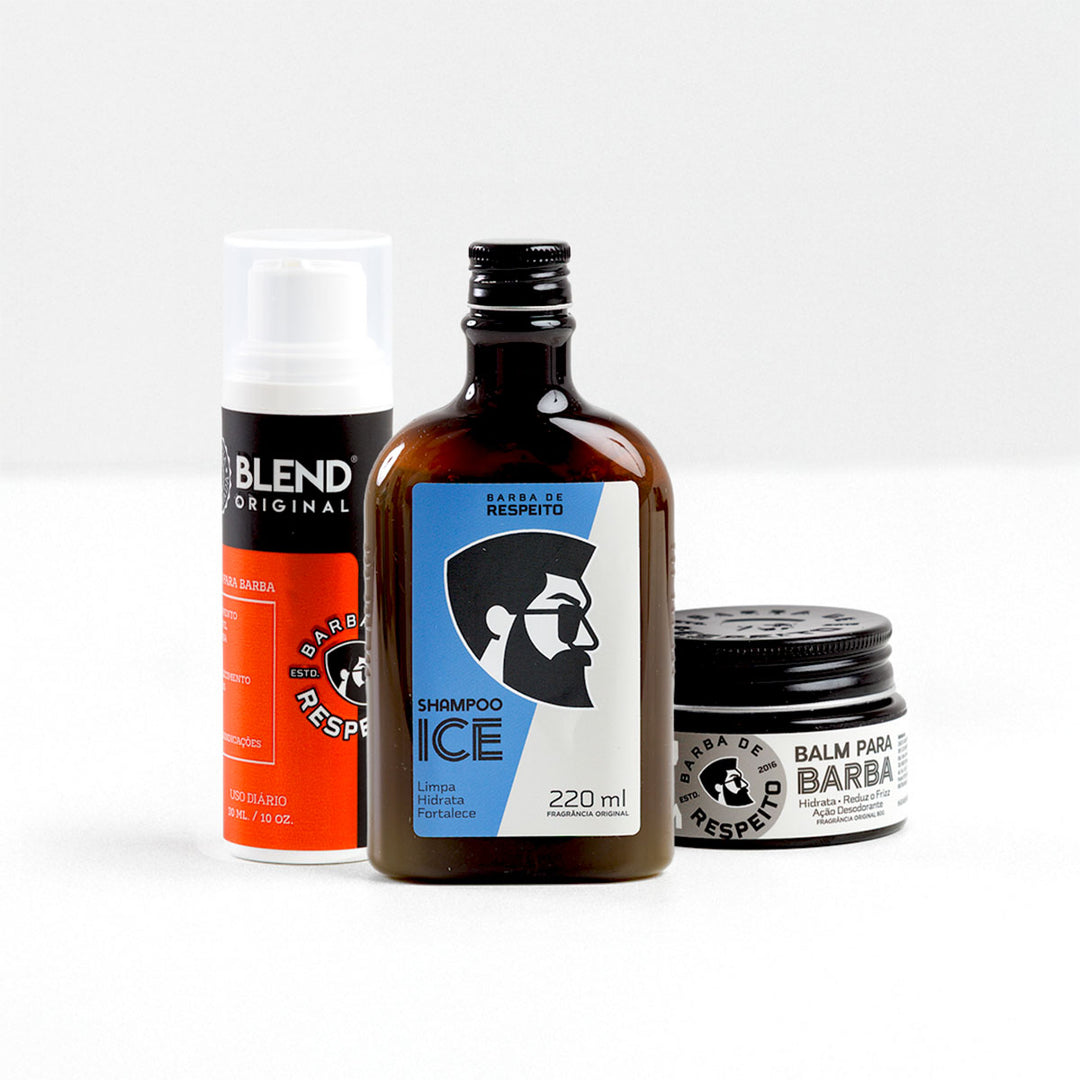 Kit de cuidados para barba da Barba de Respeito com três produtos sobre fundo branco: à esquerda, o Blend Original (tônico para crescimento, 30 mL) com rótulo preto e vermelho; ao centro, o Shampoo Ice (220 mL) em frasco âmbar com rótulo azul e branco; à direita, o Balm para Barba (60 g) em pote preto com rótulo branco e tampa rosqueável.